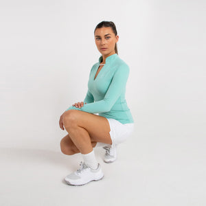 Sustainable mint long sleeved womens golf top with high neck