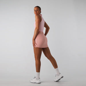 Sustainable, stretchy golf skirt with built in shorts in pink